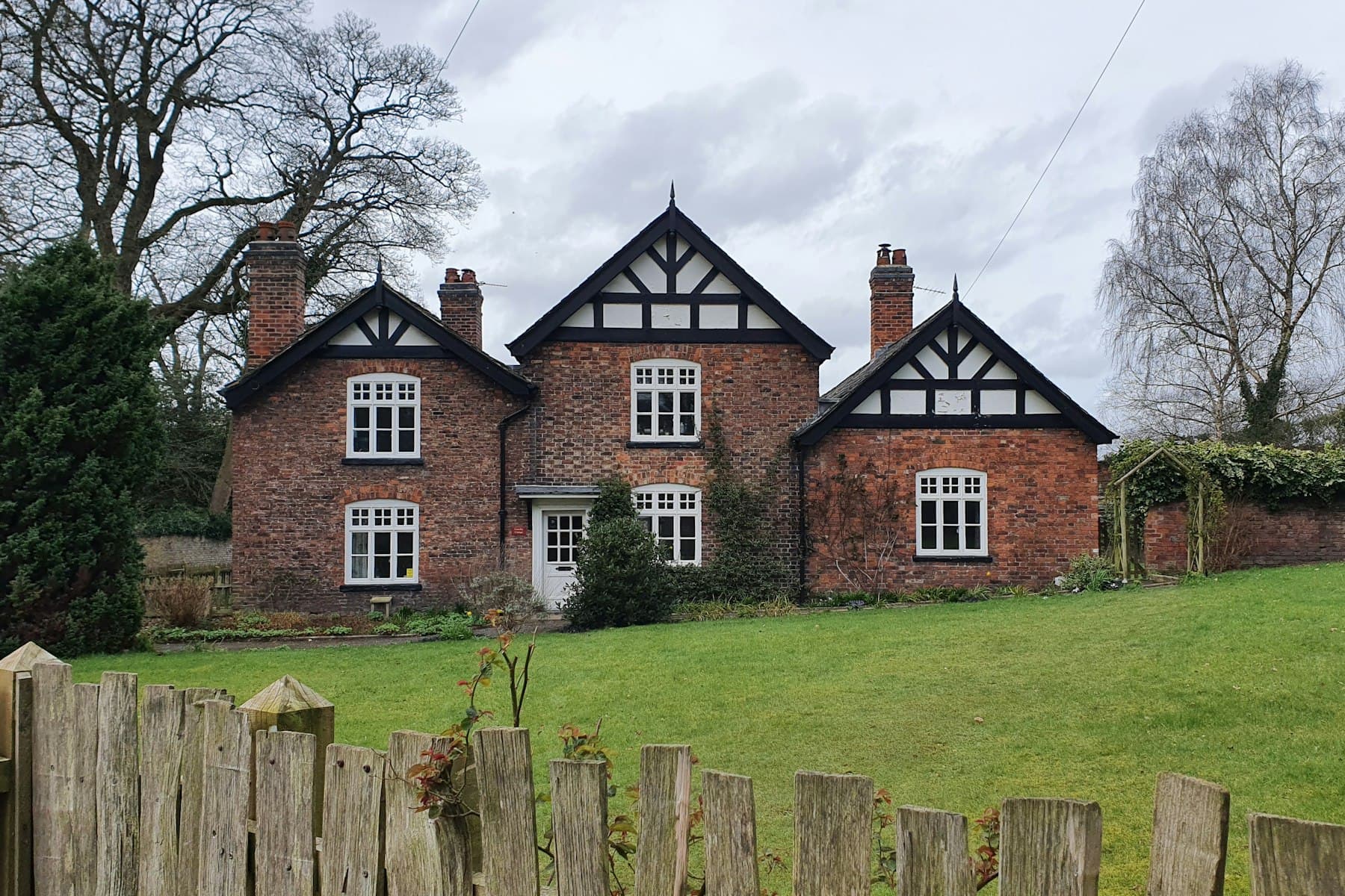 A timber-framed rural property set in open countryside